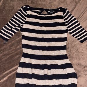 Black and gold sweater .